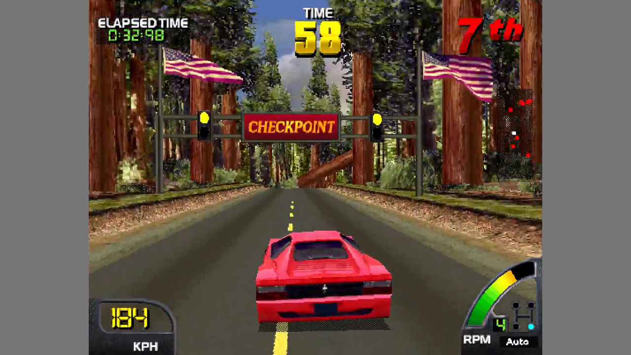 Screenshot from Cruis'n USA, featuring a checkpoint coming up on the road