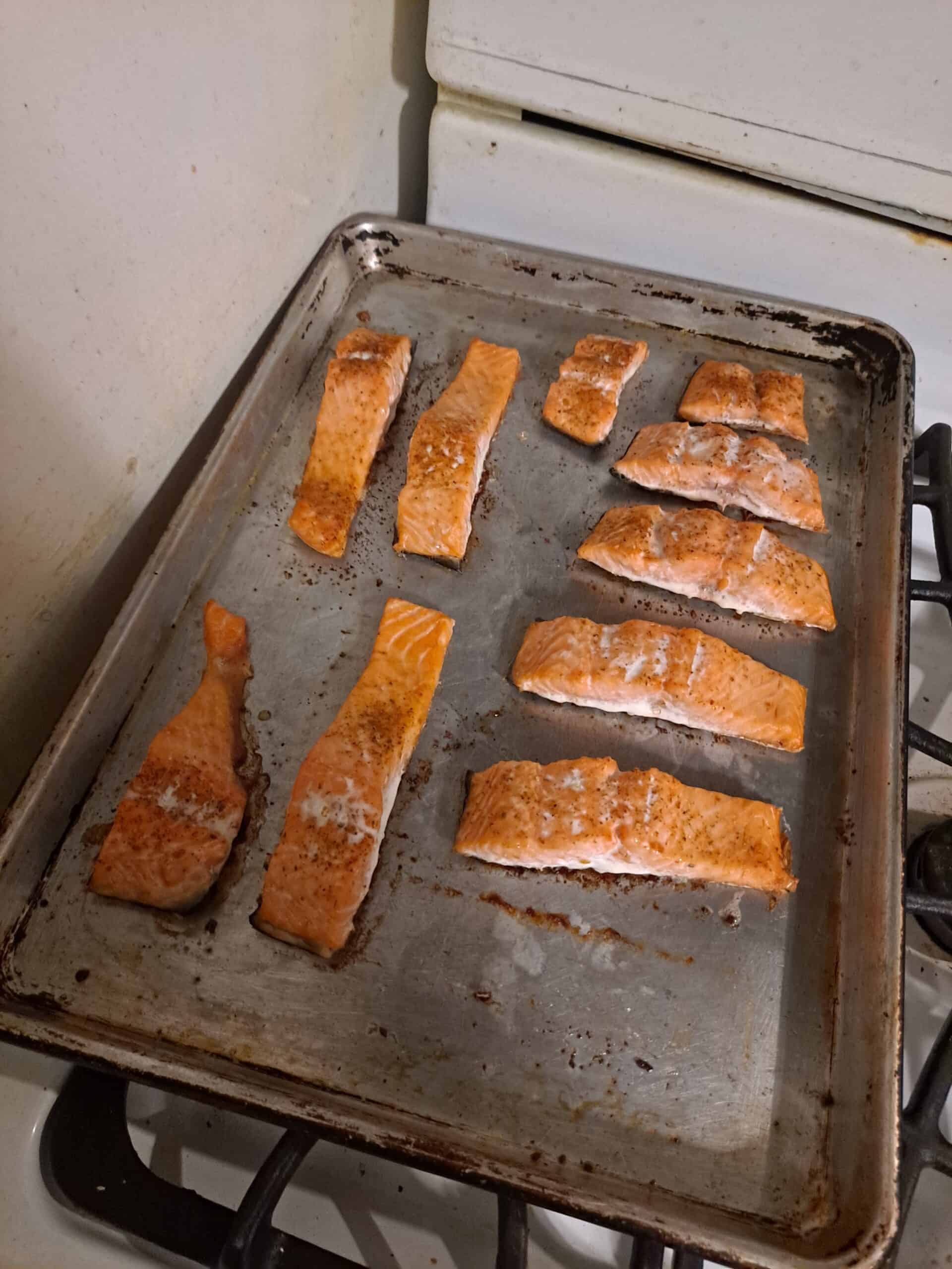 Image of baked salmon on metal sheet pan